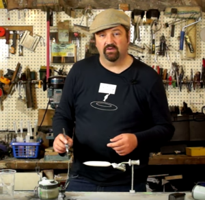 Paul Adams Preparing to Paint a Pike Pattern on a Lure